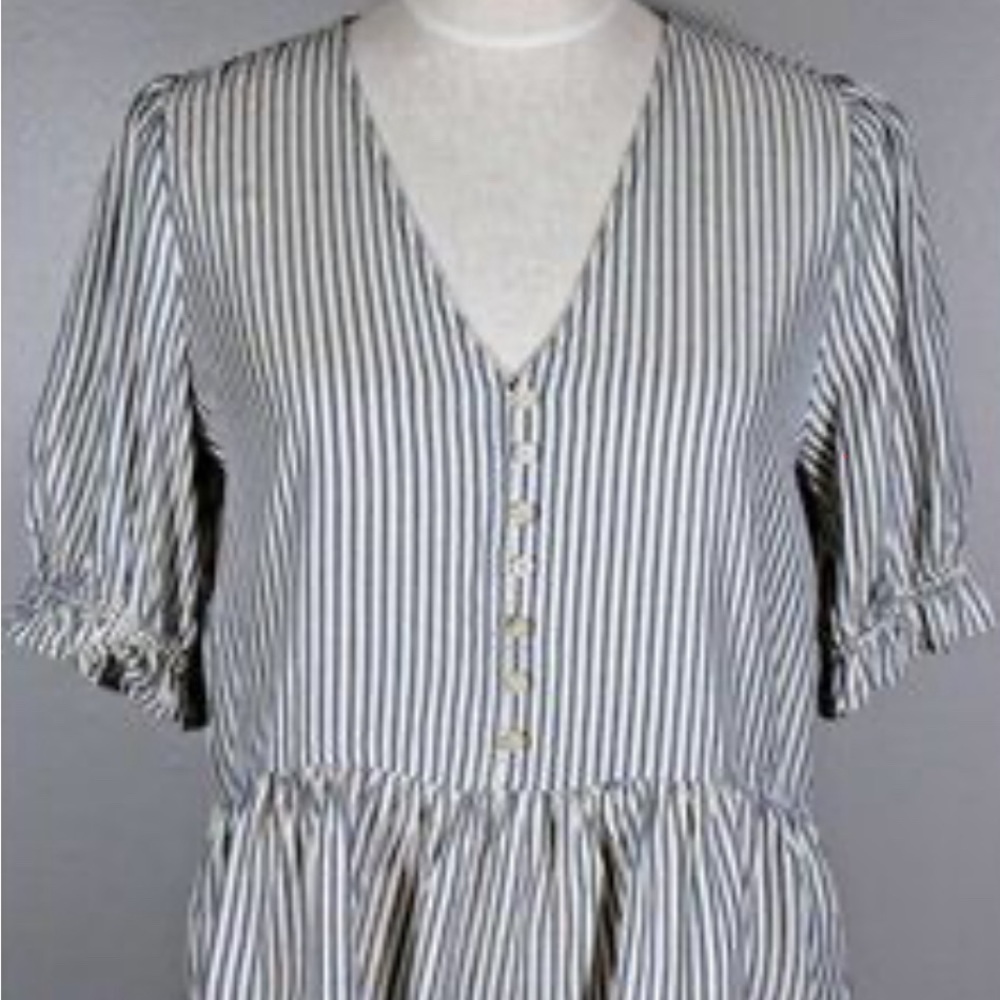Madewell size small, adorable thin striped shirt with peplum ruffles..